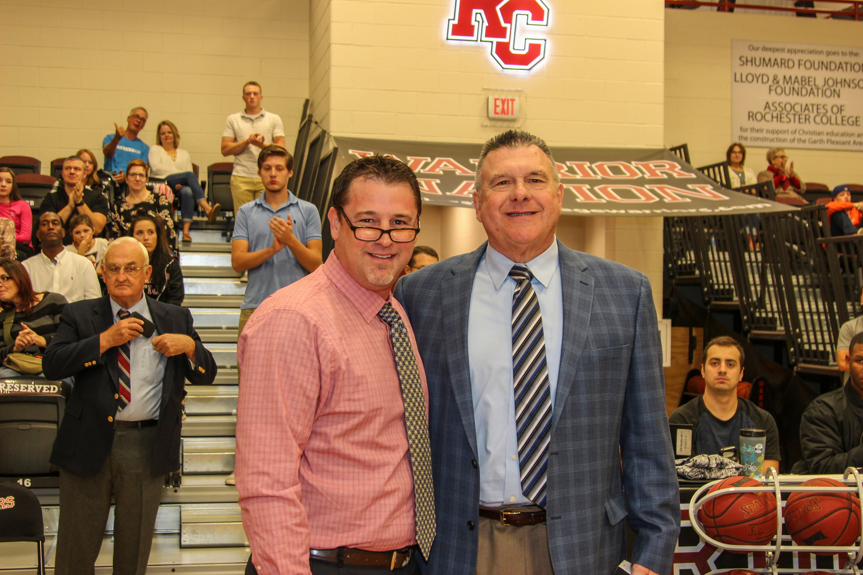 Pleasant pictured alongside son and VP of Athletics Dr. Klint Pleasant