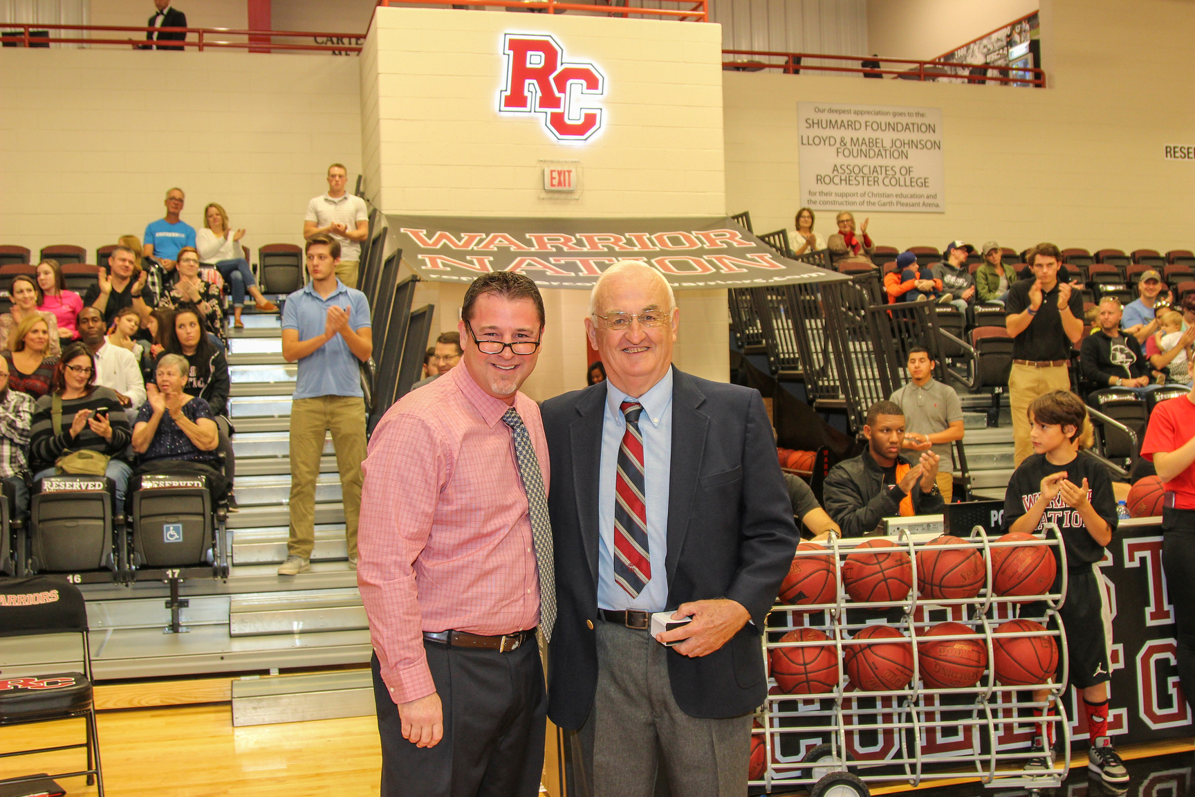 Beaudoin pictured alongside VP of Athletics Dr. Klint Pleasant