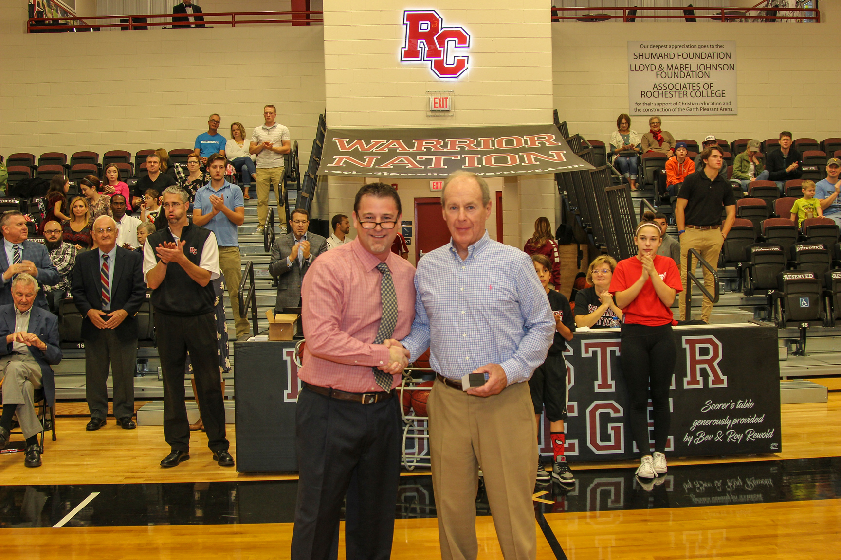 Knapp pictured alongside VP of Athletics Dr. Klint Pleasant