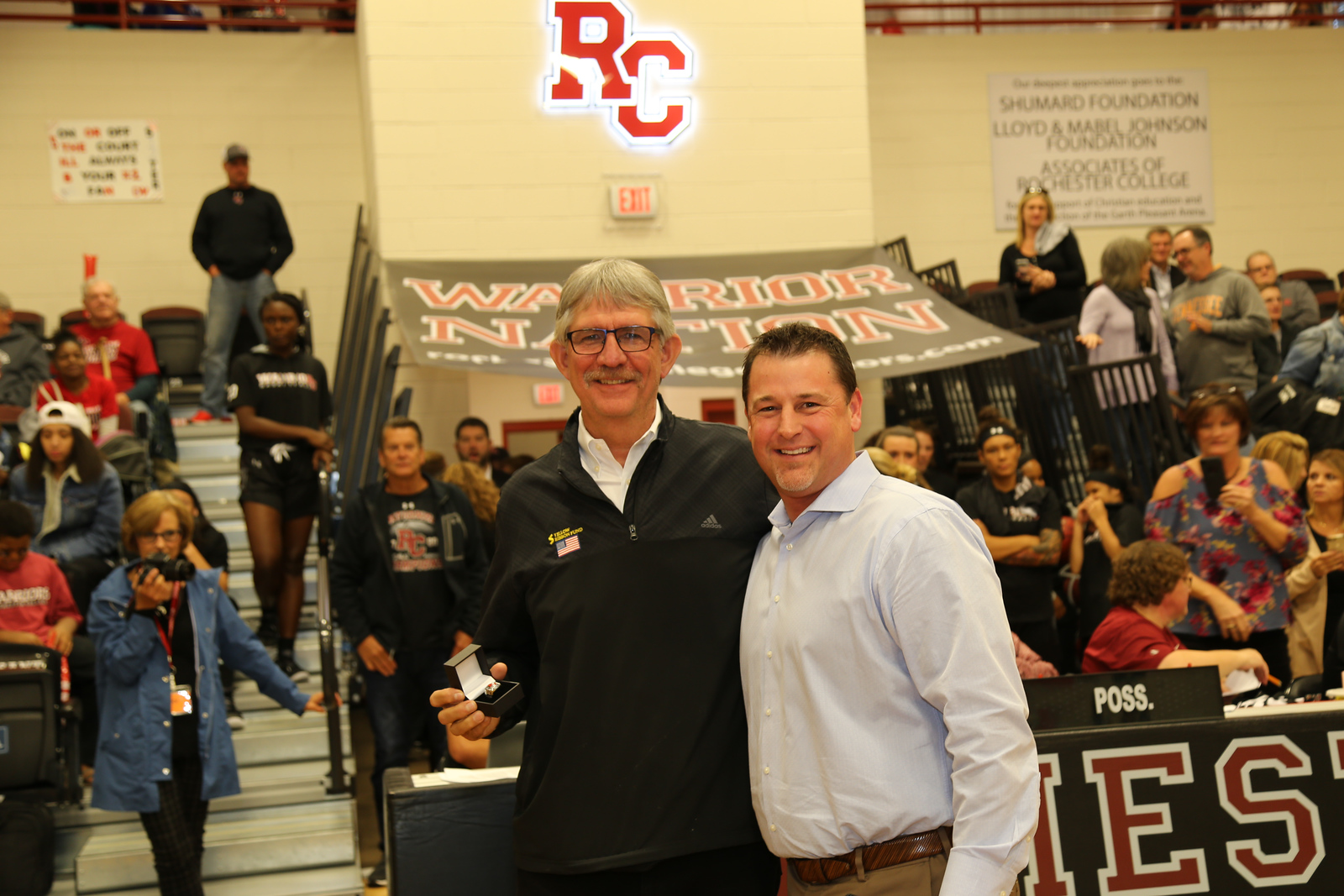 Rewold pictured alongside VP of Athletics Dr. Klint Pleasant