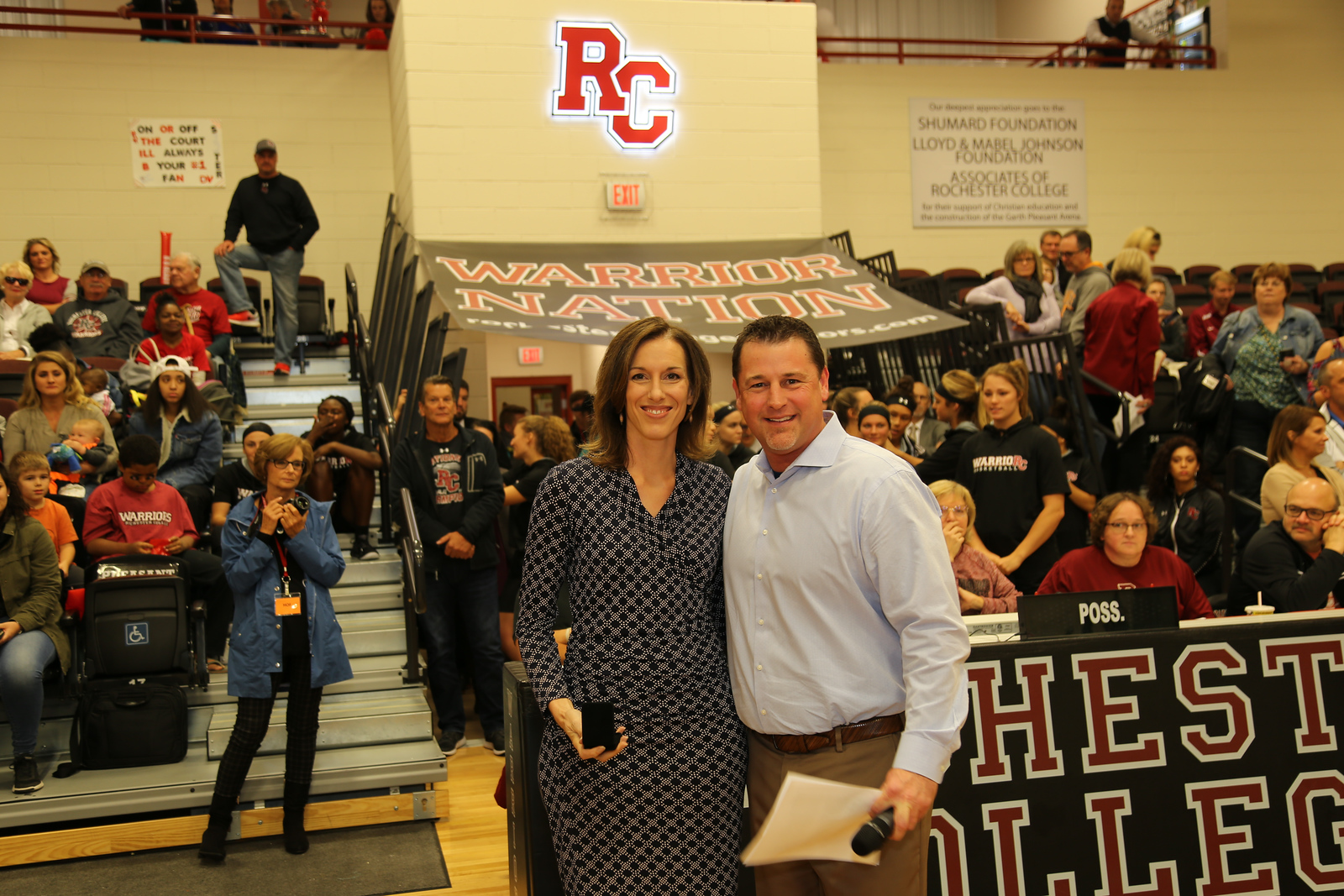 Richards-Woodall pictured alongside VP of Athletics Dr. Klint Pleasant