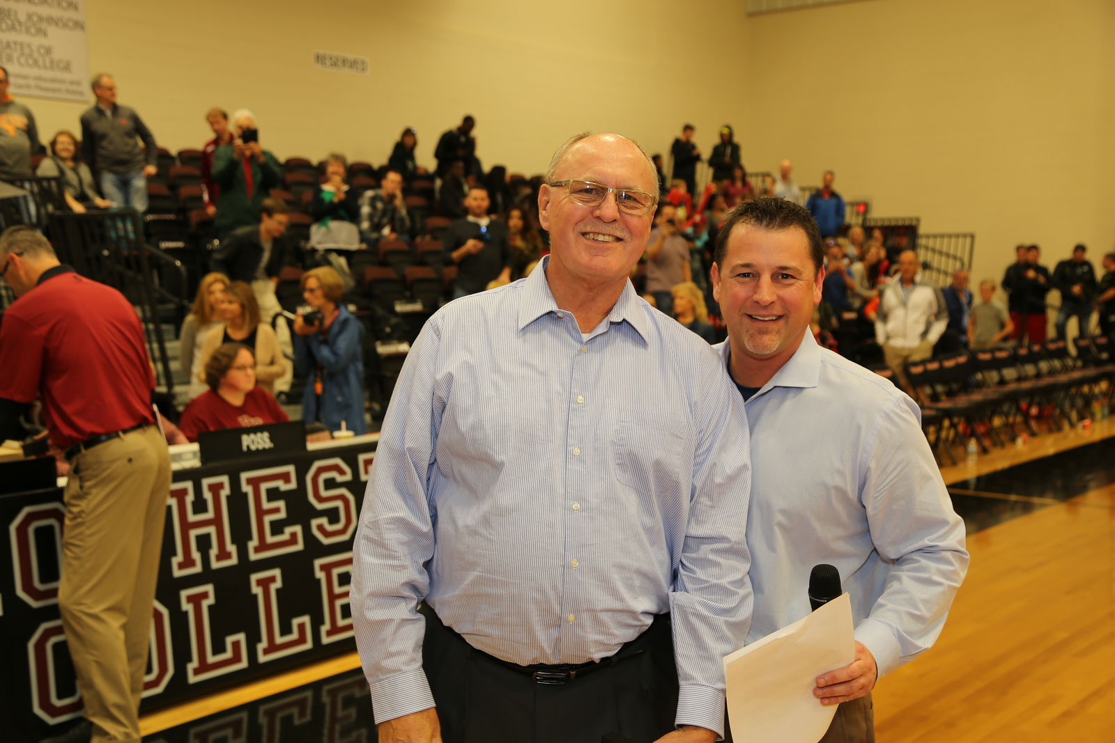 Harrison pictured alongside VP of Athletics Dr. Klint Pleasant