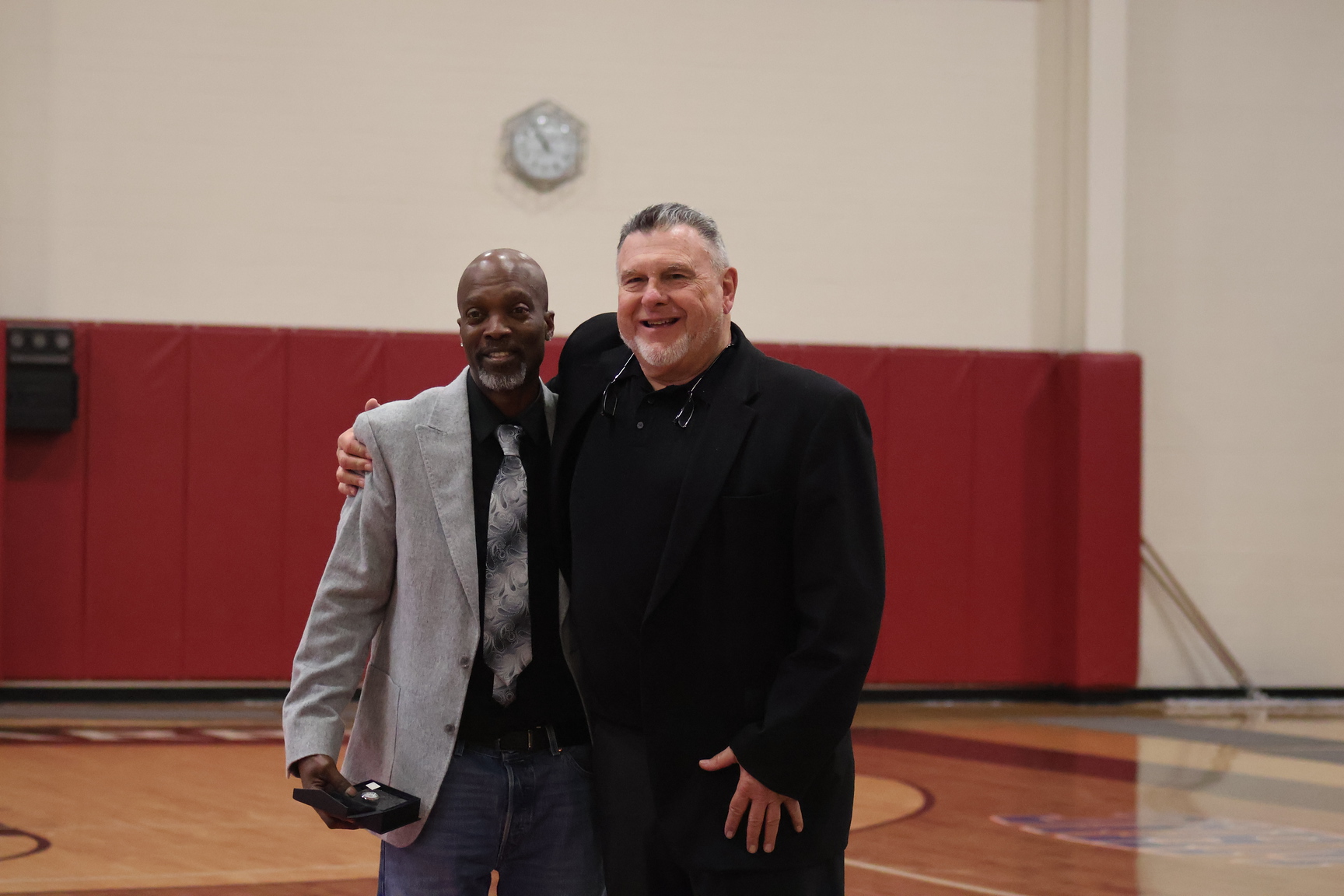 Tubbs pictured alongside Athletic Director Emeritus Garth Pleasant