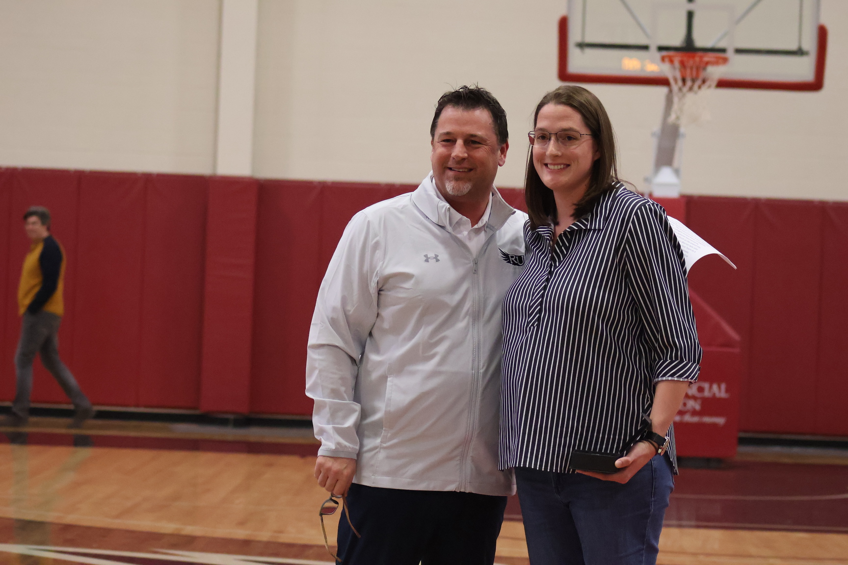 Tomaschko-Putman pictured alongside VP of Athletics Dr. Klint Pleasant